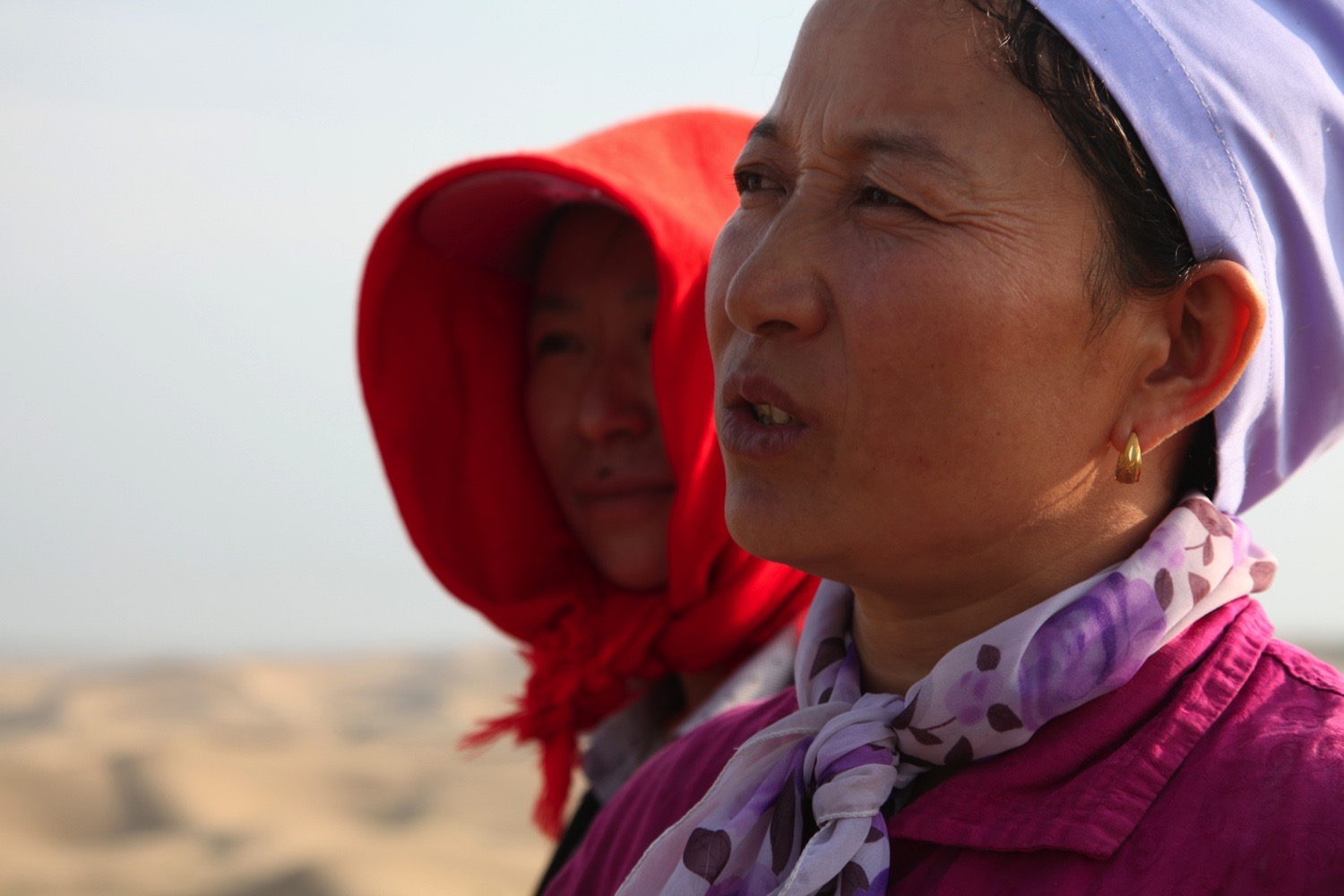 Two women in the Ningxia desert, China